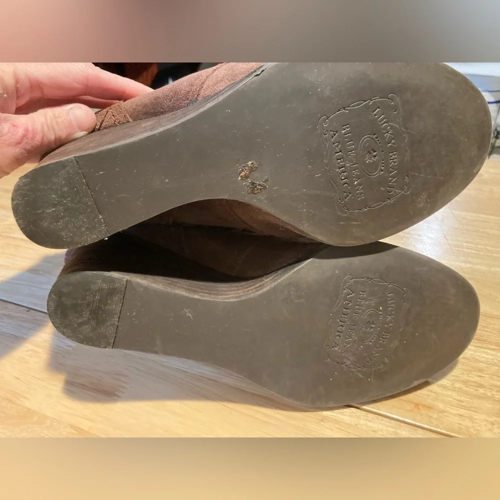 Lucky Brand wedged boots in size 9 1/2 M with an approximate 2 1/2 inch heel